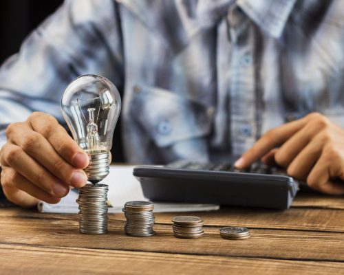 man-cunting-stack-coins man-cunting-stack-coins